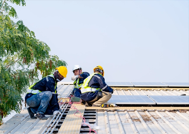Workers on a commercial roof
